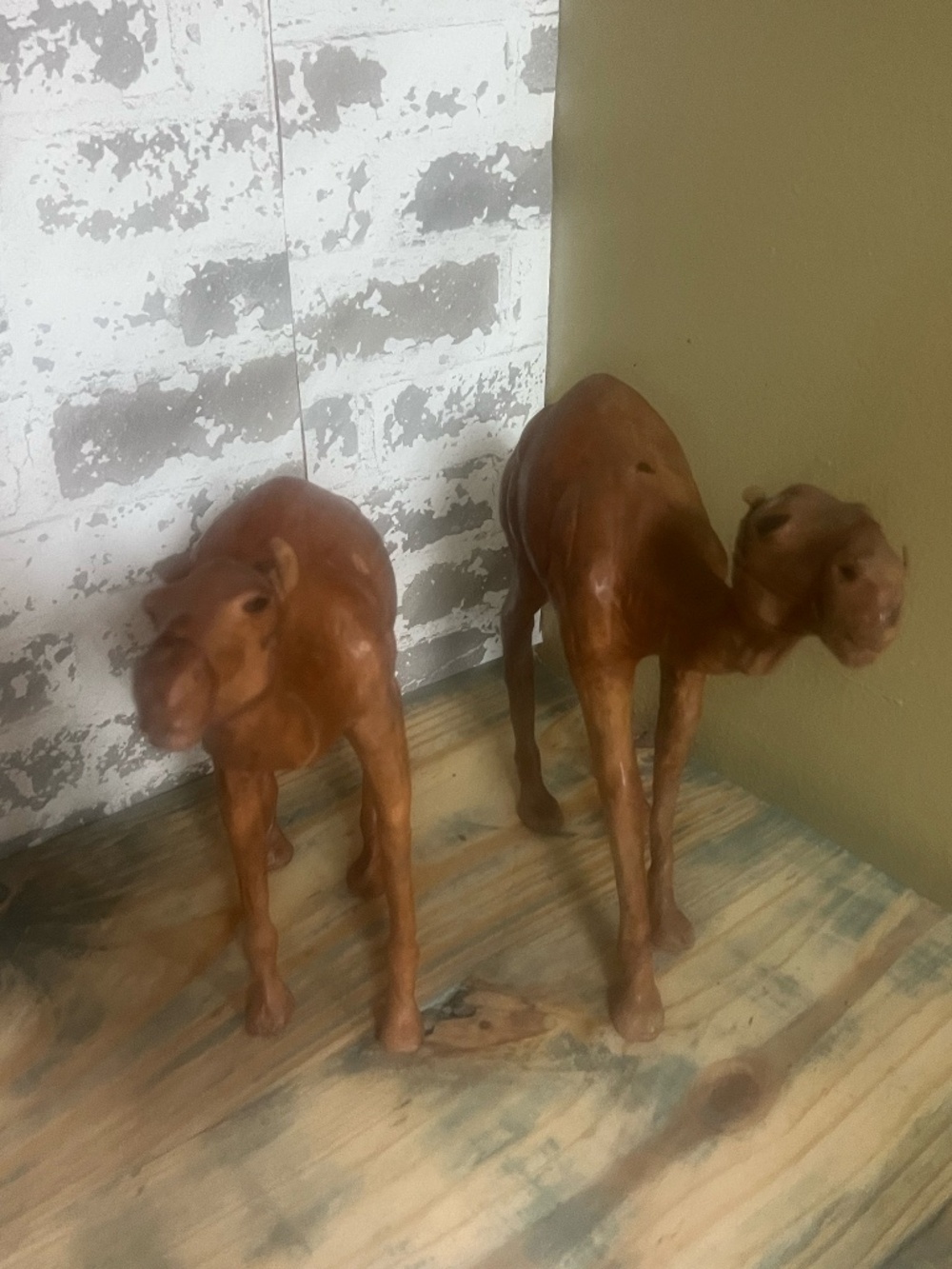 Set of vintage handcrafted brown leather-wrapped camel figurines Life like eyes